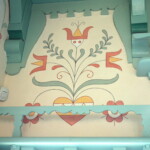 Dekorativní motiv nad oknem střední části