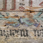 Detail poškozené malby před restaurováním